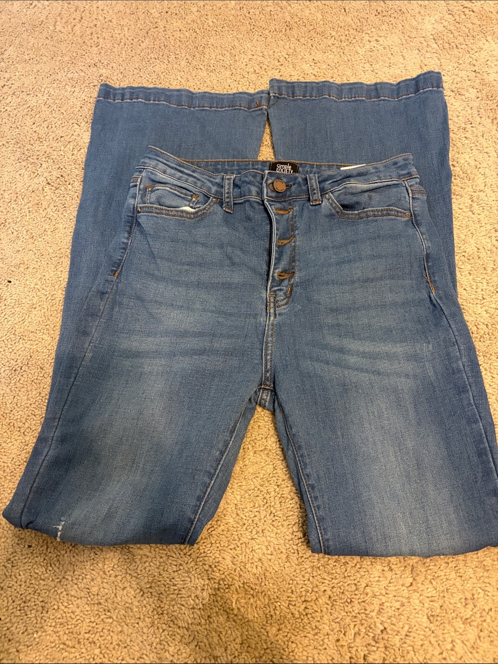 High-Rise Flare Jeans in Medium Blue - Stretch Denim